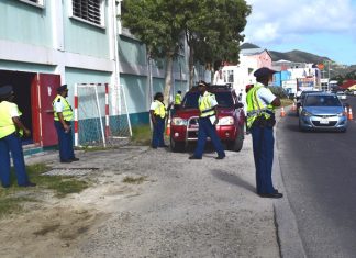 Police cadets hold traffic controls