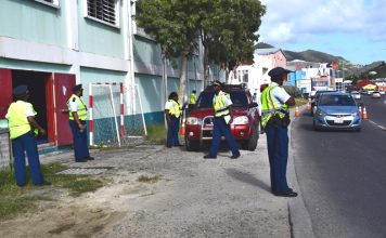Police cadets hold traffic controls