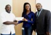 Minister Emmanuel donates to Sint Maarten Pro Softball Association.