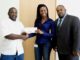 Minister Emmanuel donates to Sint Maarten Pro Softball Association.