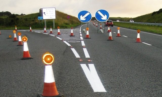 Paint works on Sucker Garden Road and Belair Road Patch Work on Tuesday
