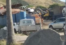 BREAKING NEWS: Local authorities raid Pond Island metal scrap company