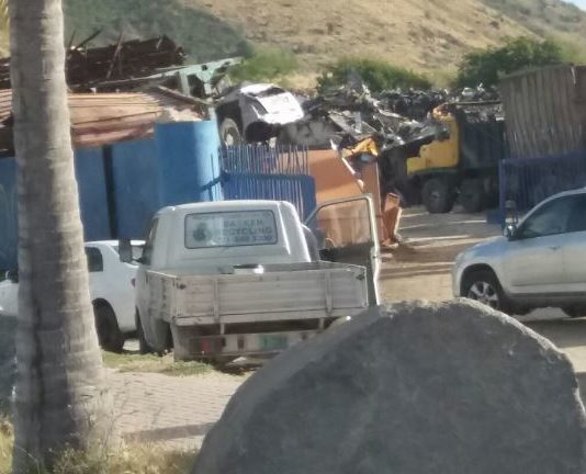 BREAKING NEWS: Local authorities raid Pond Island metal scrap company