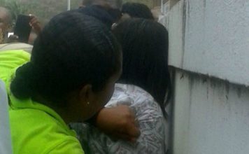 Police restrains mental patient.