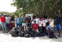 MPC students clean-up Mullet Bay Beach