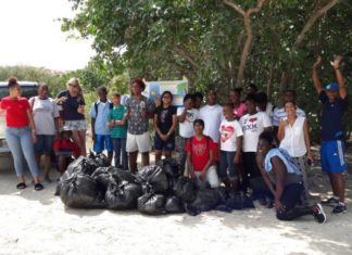 MPC students clean-up Mullet Bay Beach