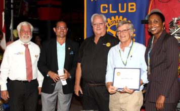 Rotary Club Mid Isle award two with Paul Harris Fellow award