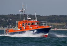 Volunteer crew members of SNSM rescue couple