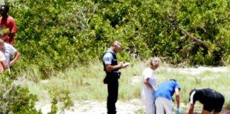 UPDATE: Hikers find partially submerged body in water