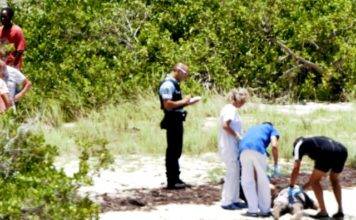 UPDATE: Hikers find partially submerged body in water