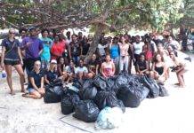 MPC High School students learn about Coral Restoration and clean up Mullet Bay Beach with the Sint Maarten Nature Foundation