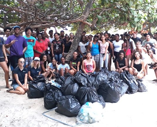 MPC High School students learn about Coral Restoration and clean up Mullet Bay Beach with the Sint Maarten Nature Foundation