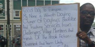 Another protest: Teacher takes message directly to embattled PM Harris
