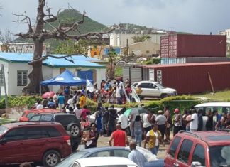 Tzu Chi helps distribute Mormon Church relief to 609 families