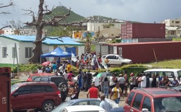 Tzu Chi helps distribute Mormon Church relief to 609 families