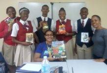Charlotte Brookson Academy gift of books in time for “We Christmas Village”