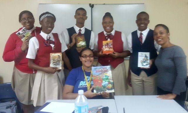 Charlotte Brookson Academy gift of books in time for “We Christmas Village”