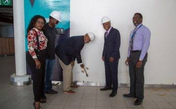 Minister De Weever Kicks Off Demolition of Interior of Airport Terminal Building