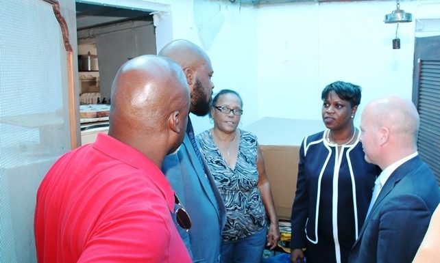 Prime Minister Leona Romeo Marlin & State Secretary Raymond Knops visit Roof Repair Program Candidates
