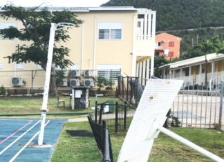 Minister Wuite signs off on repairs for Melford Hazel Sports Center and basketball courts