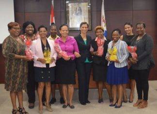 St. Maarten’s House of Parliament recognizes female staff for their dedication and service.