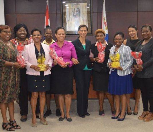 St. Maarten’s House of Parliament recognizes female staff for their dedication and service.
