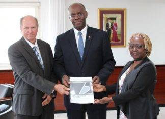 Governor Holiday receives report informateurs