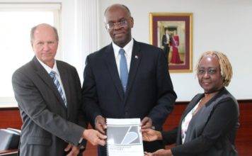 Governor Holiday receives report informateurs