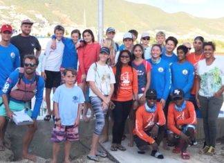 Minister Wuite guest of Sint Maarten Yacht Club as they re-open youth sailing lessons from new dock.