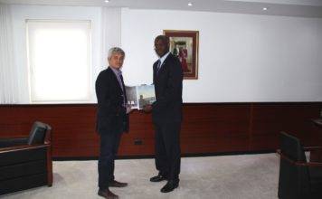 Governor receives final report Theodore Heyliger