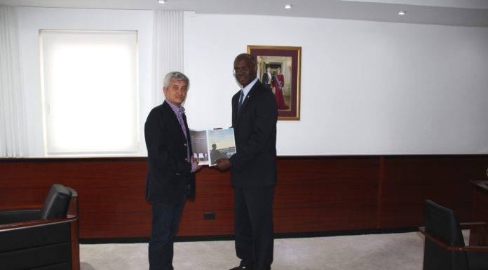 Governor receives final report Theodore Heyliger