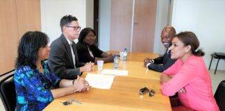 Minister Plenipotentiary and deputy Minister Plenipotentiary sign declaration with Electoral Council