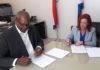 Minister De Weever signs Covenant with medical School