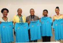 Handing Over the EOM Polo Shirts to the Minister of Education