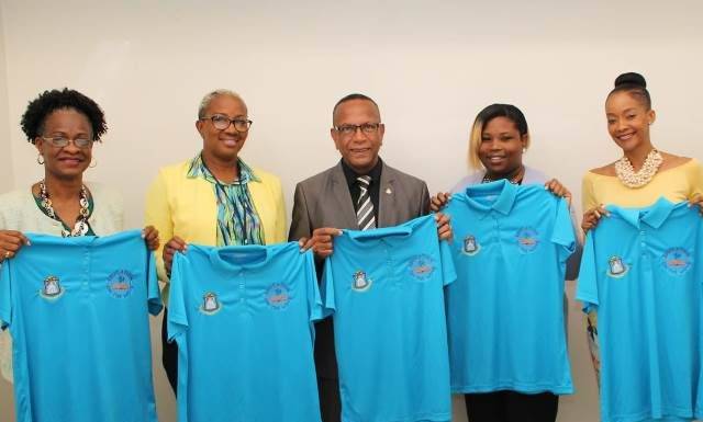 Handing Over the EOM Polo Shirts to the Minister of Education