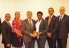 COM presents token of appreciation to Vice President of Council of State Donner