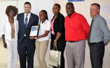 Tourism Minister Johnson pays surprise visit to Junior Minister Kiara at School