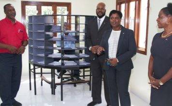 Prime Minister Romeo Marlin visits Postal Services Sint Maarten new location at former Civil Registry Building