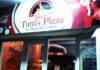 Tutti’s Pizza will be opening back this Saturday Dec 1st
