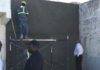 Minister De Weever views House of Detention repairs