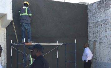 Minister De Weever views House of Detention repairs