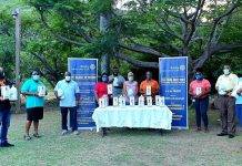 Rotary Sunset Donates Hand Sanitizers and Dispensers To Primary Schools