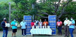 Rotary Sunset Donates Hand Sanitizers and Dispensers To Primary Schools