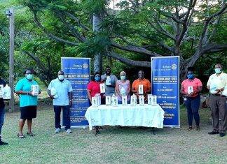 Rotary Sunset Donates Hand Sanitizers and Dispensers To Primary Schools