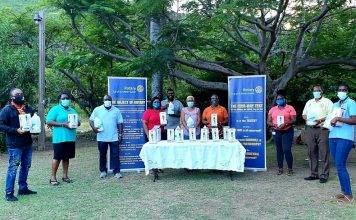 Rotary Sunset Donates Hand Sanitizers and Dispensers To Primary Schools