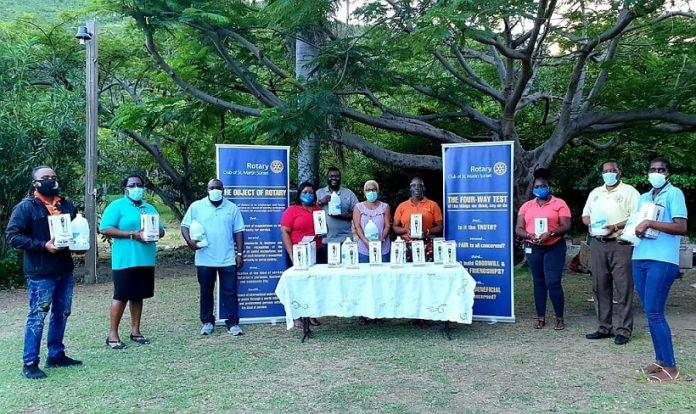 Rotary Sunset Donates Hand Sanitizers and Dispensers To Primary Schools