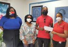 The St. Maarten National Heritage Foundation & Museum receives a donation from N.V. GEBE