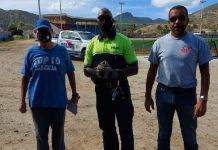 Community officers with together with a community partner assisted coach Tom at the Little League Stadium