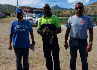 Community officers with together with a community partner assisted coach Tom at the Little League Stadium