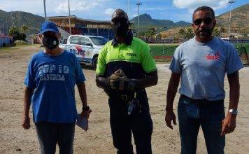 Community officers with together with a community partner assisted coach Tom at the Little League Stadium